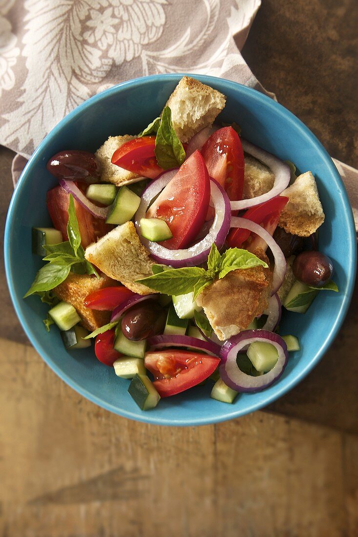 Panzanella (bread salad with tomatoes, cucumber and olives, Italy)