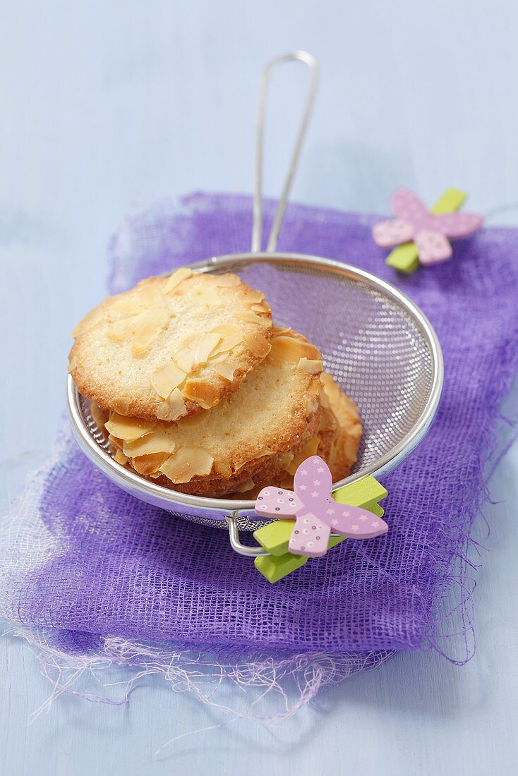 Almond biscuits in a sieve