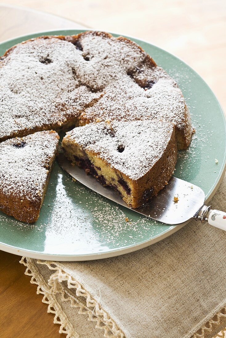 Blueberry cake with icing sugar