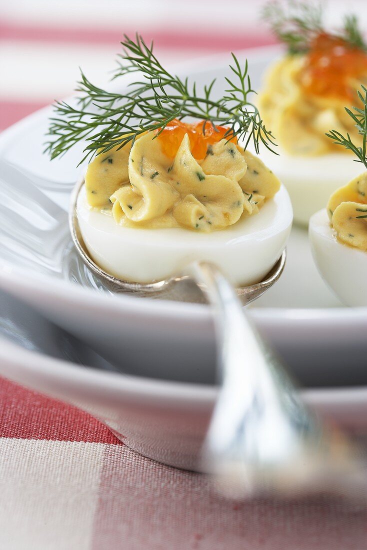 Stuffed eggs with caviar and dill
