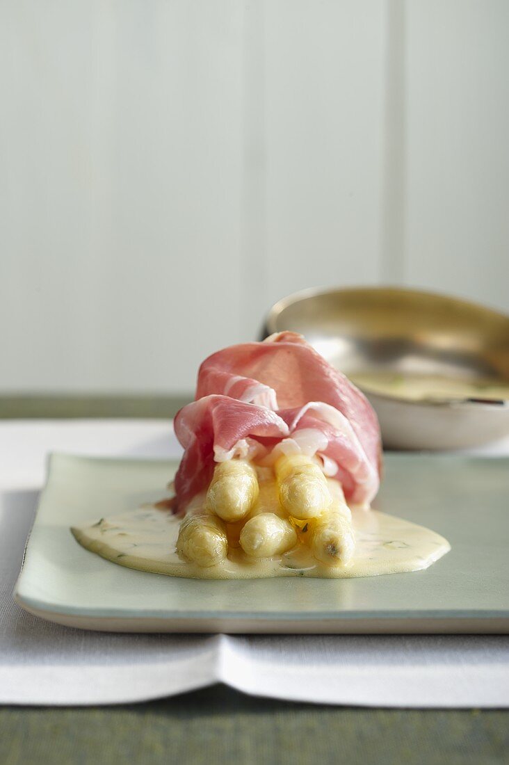 White asparagus with ham and chervil sauce
