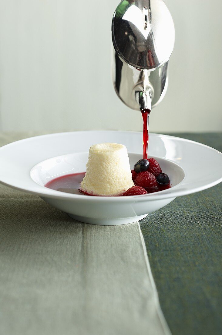 Quark souffle with berry sauce