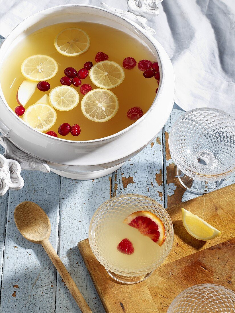 Lemon punch with apples and cranberries