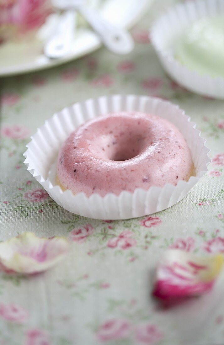 A strawberry cream doughnut