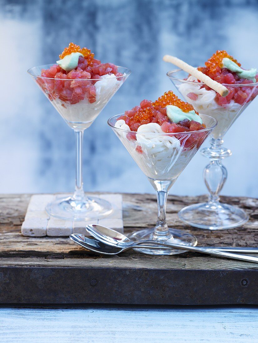 Martini cocktails with marinated tuna and caviar