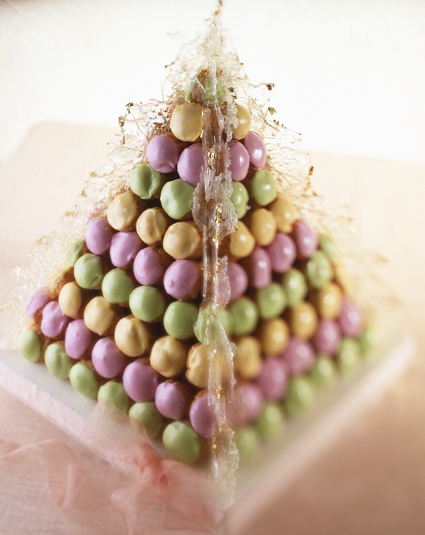 A pièce montée made of colourful macaroons (France)