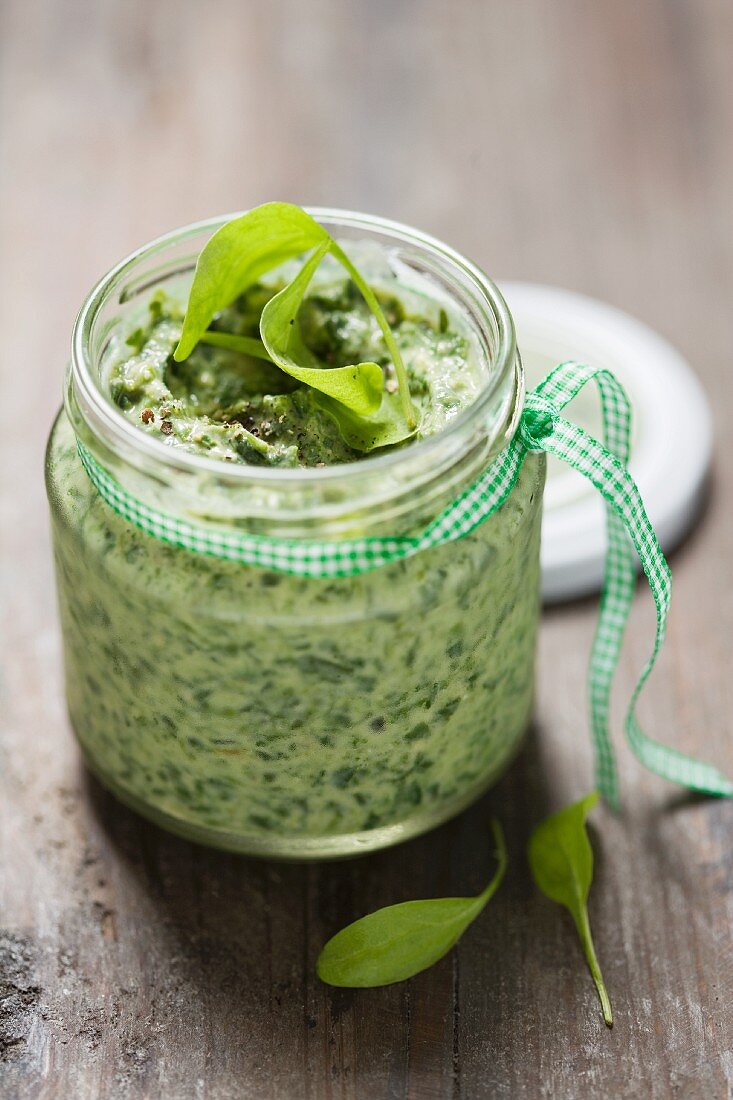 A jar of spinach spread