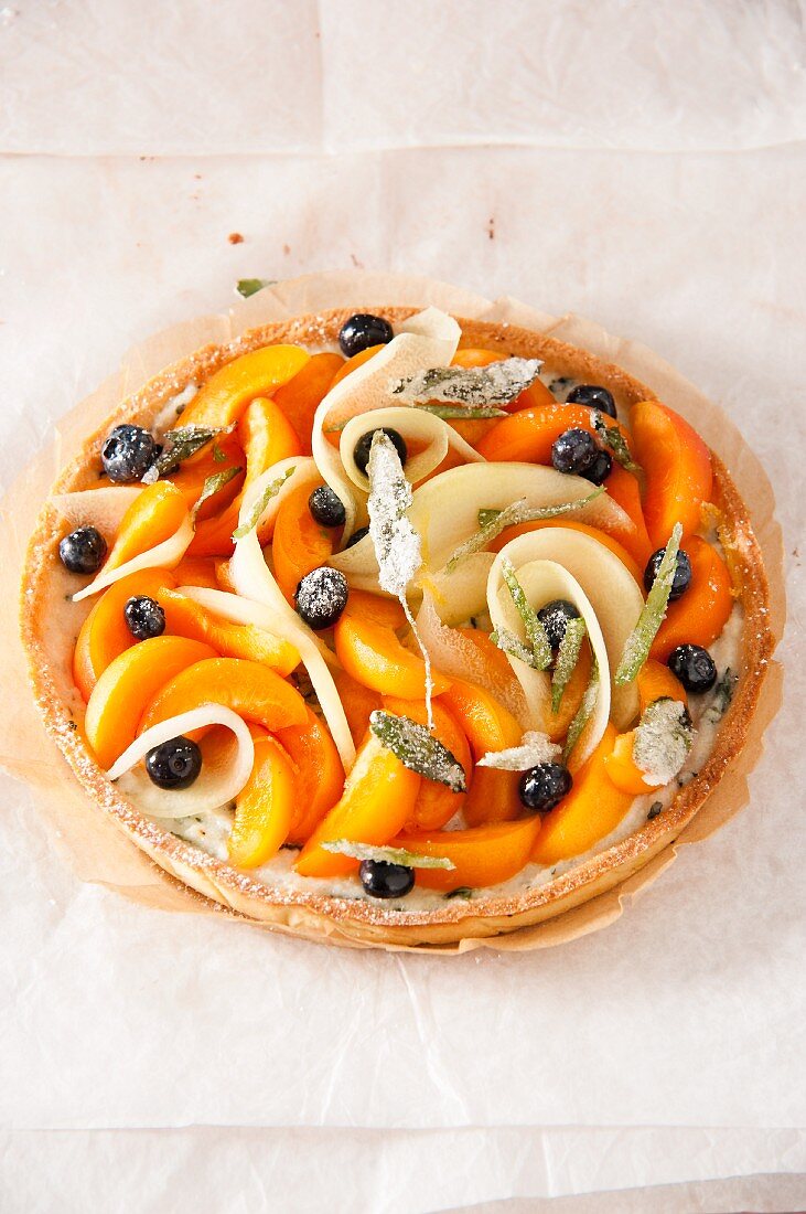 Fruit tart with sugared herbs