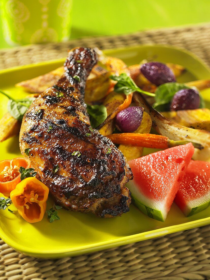Jerk chicken with watermelon and vegetables