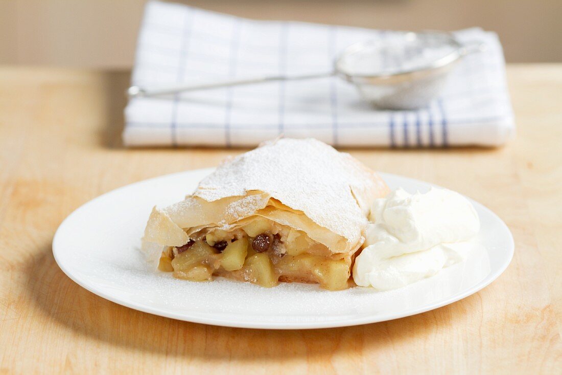 Apple strudel with cream