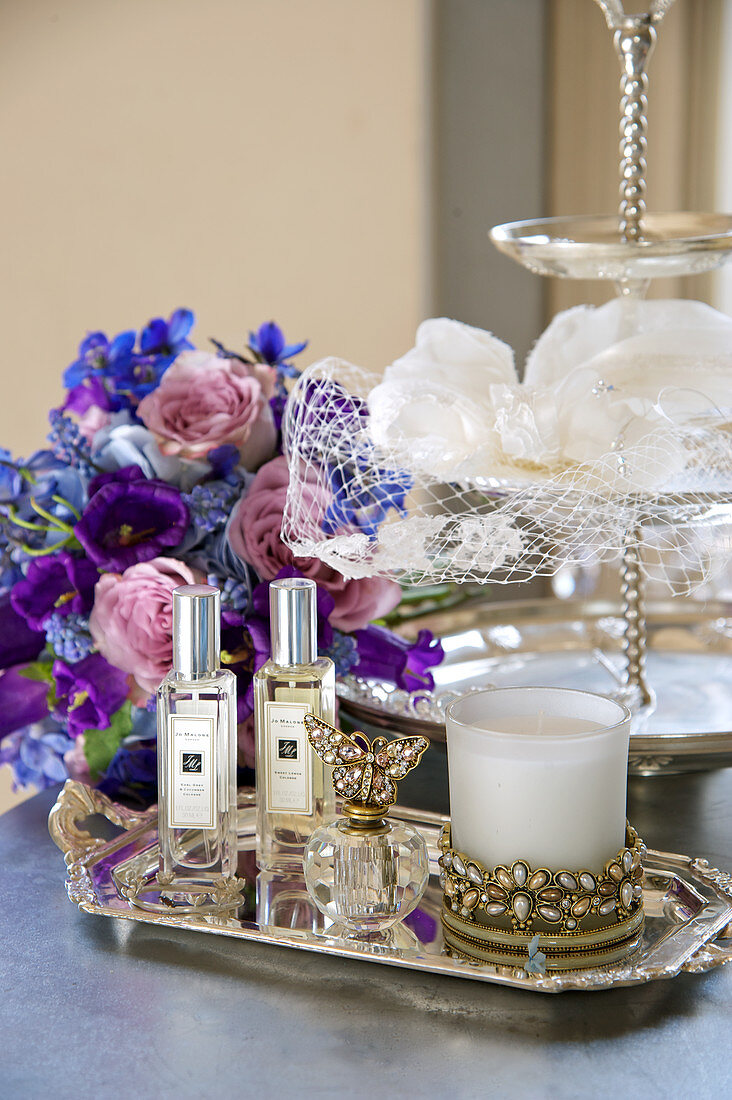 Wedding accessories: perfume, scented candles and the bridal bouquet