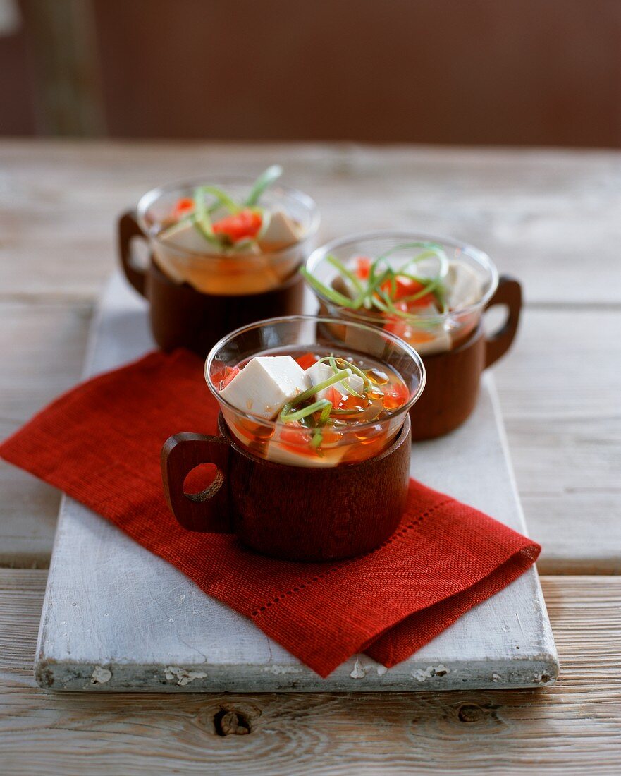 Tofu and tomato soup with spring onions