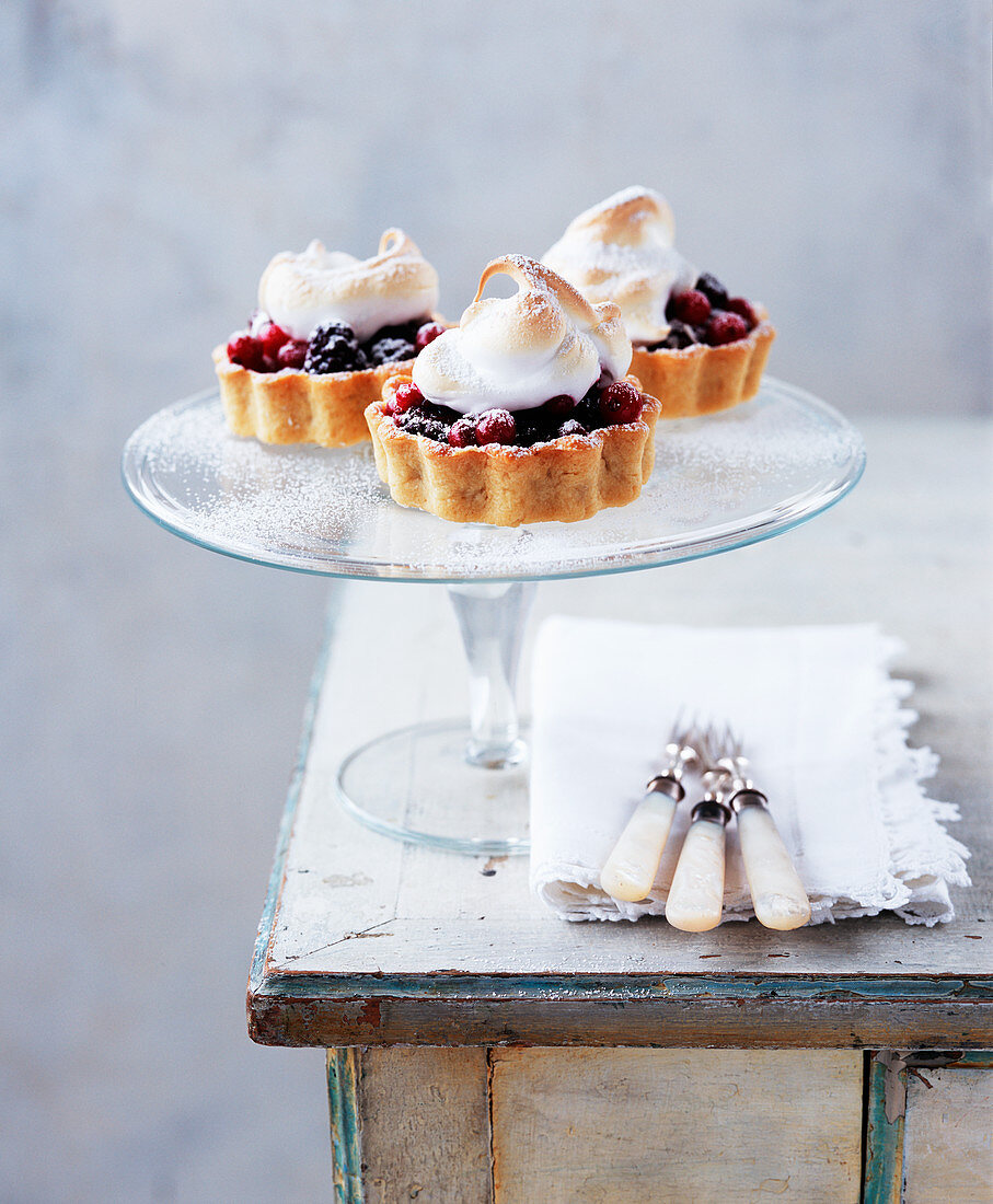 Berry tarts with meringue topping