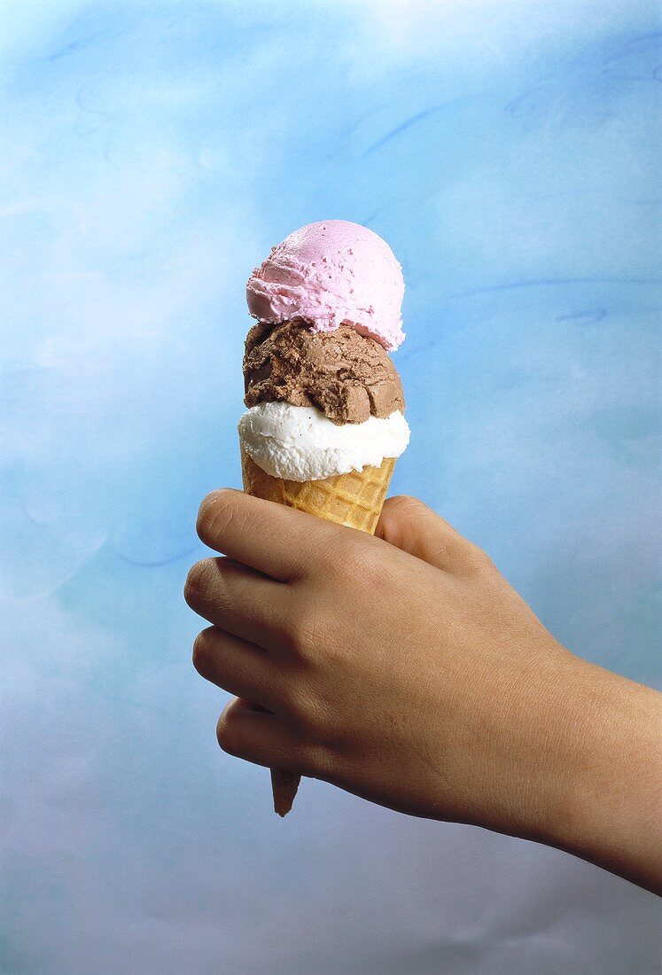 Hand Holding an Ice Cream Cone