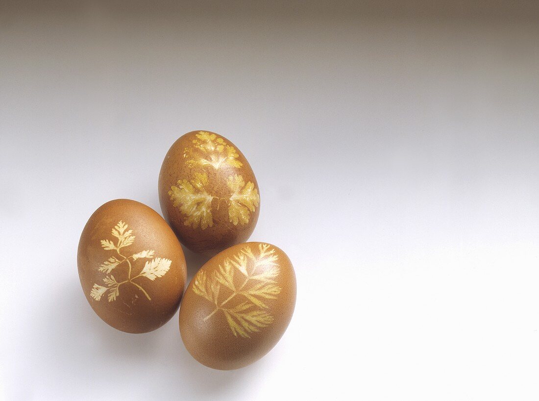 Easter eggs decorated with leaf motifs