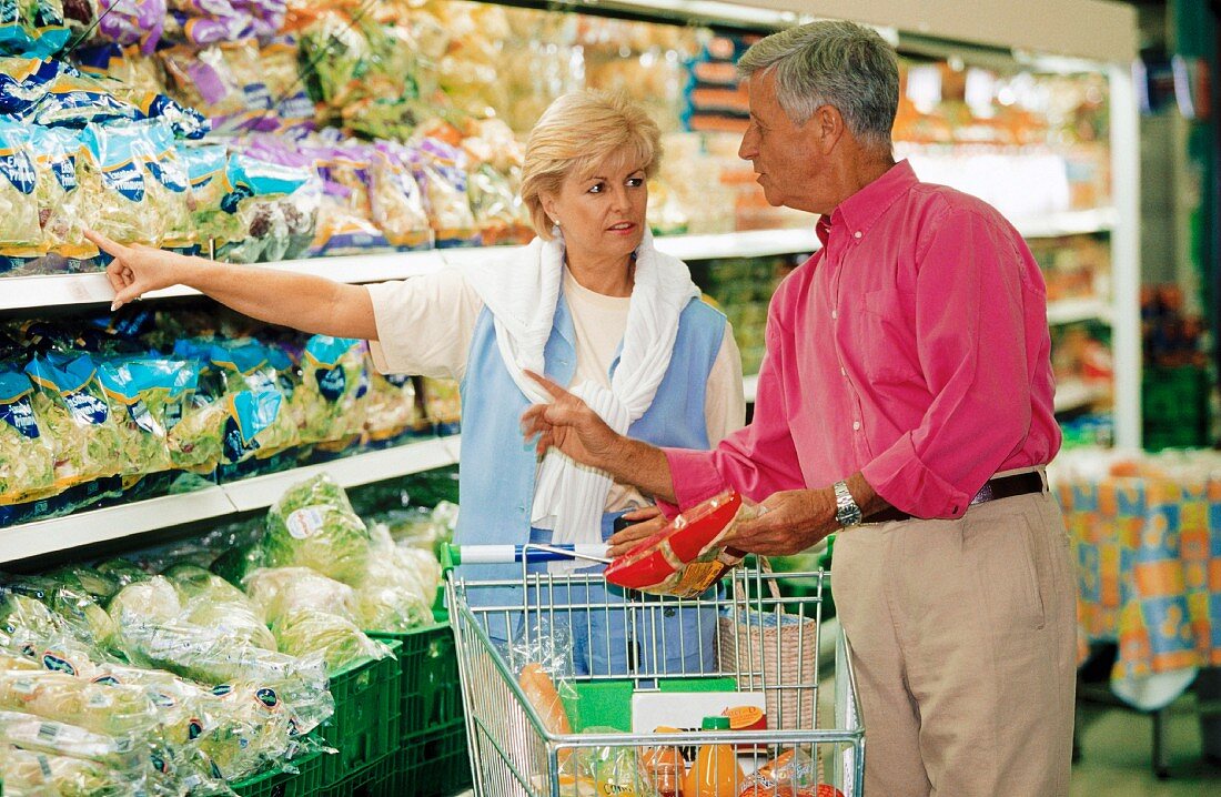 Older married couple food shopping