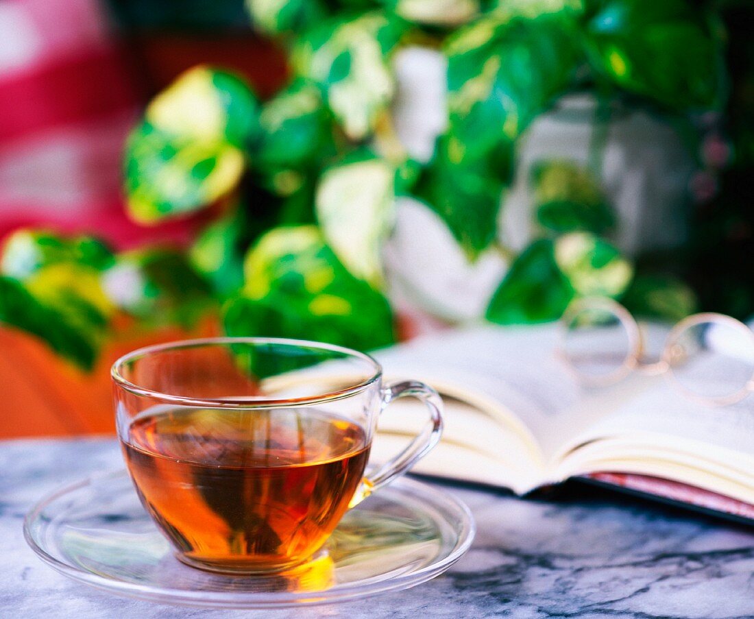 A glass cup of herbal tea