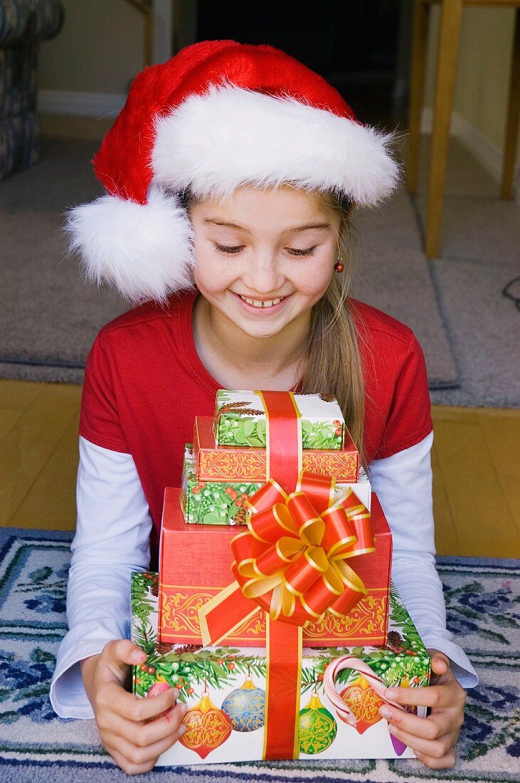 Girl with Christmas gifts