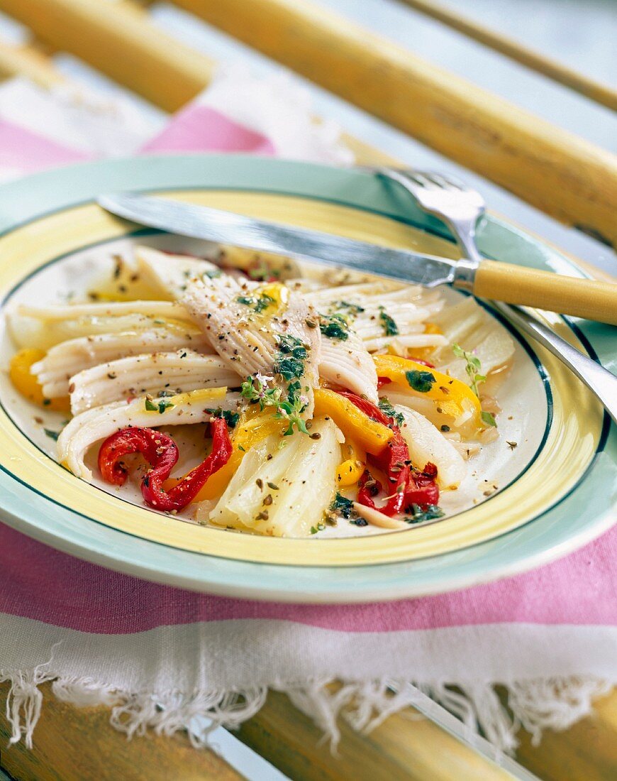 Flaked marinated skate marinated with fennel and peppers