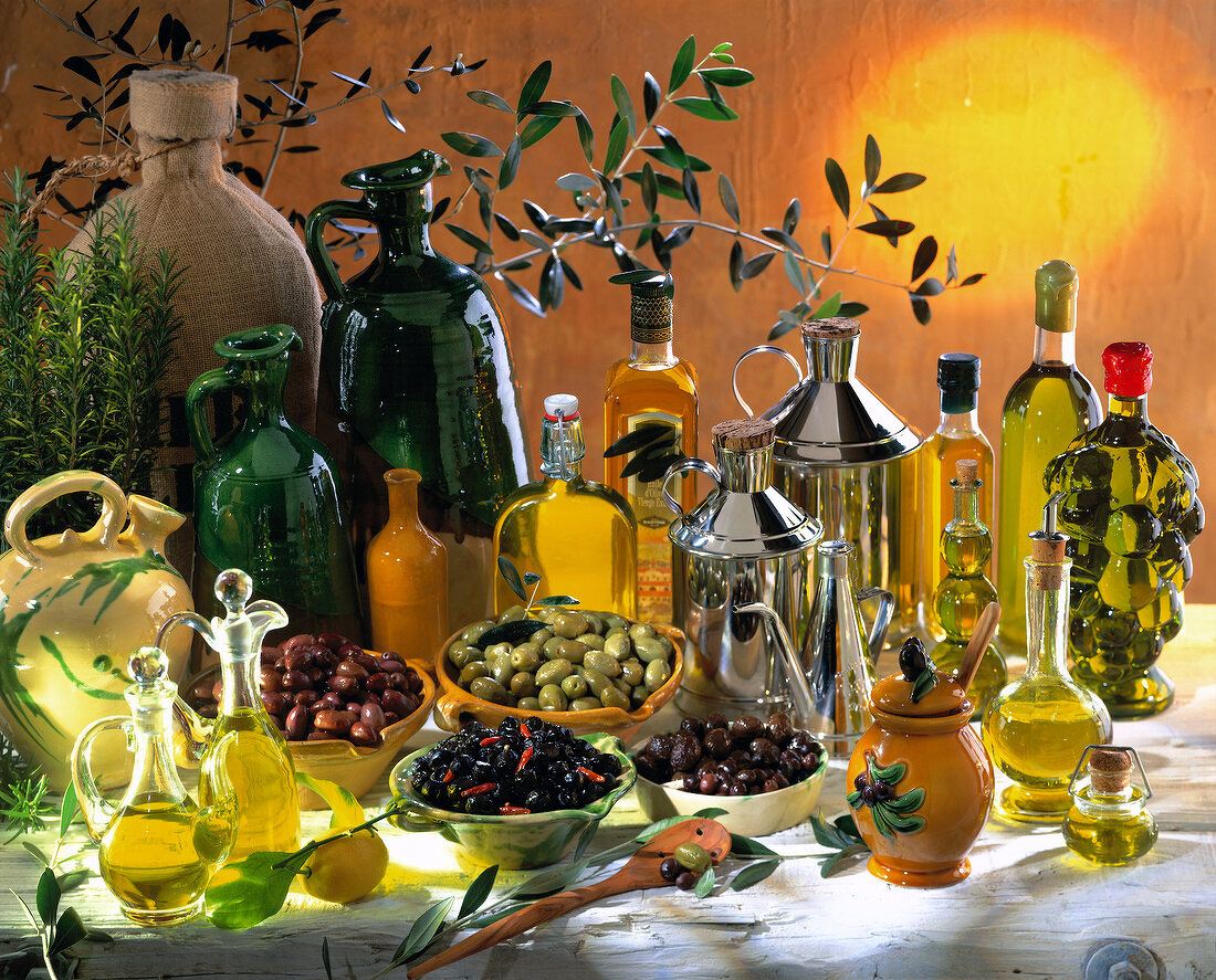 arrangement of olives and olive oils