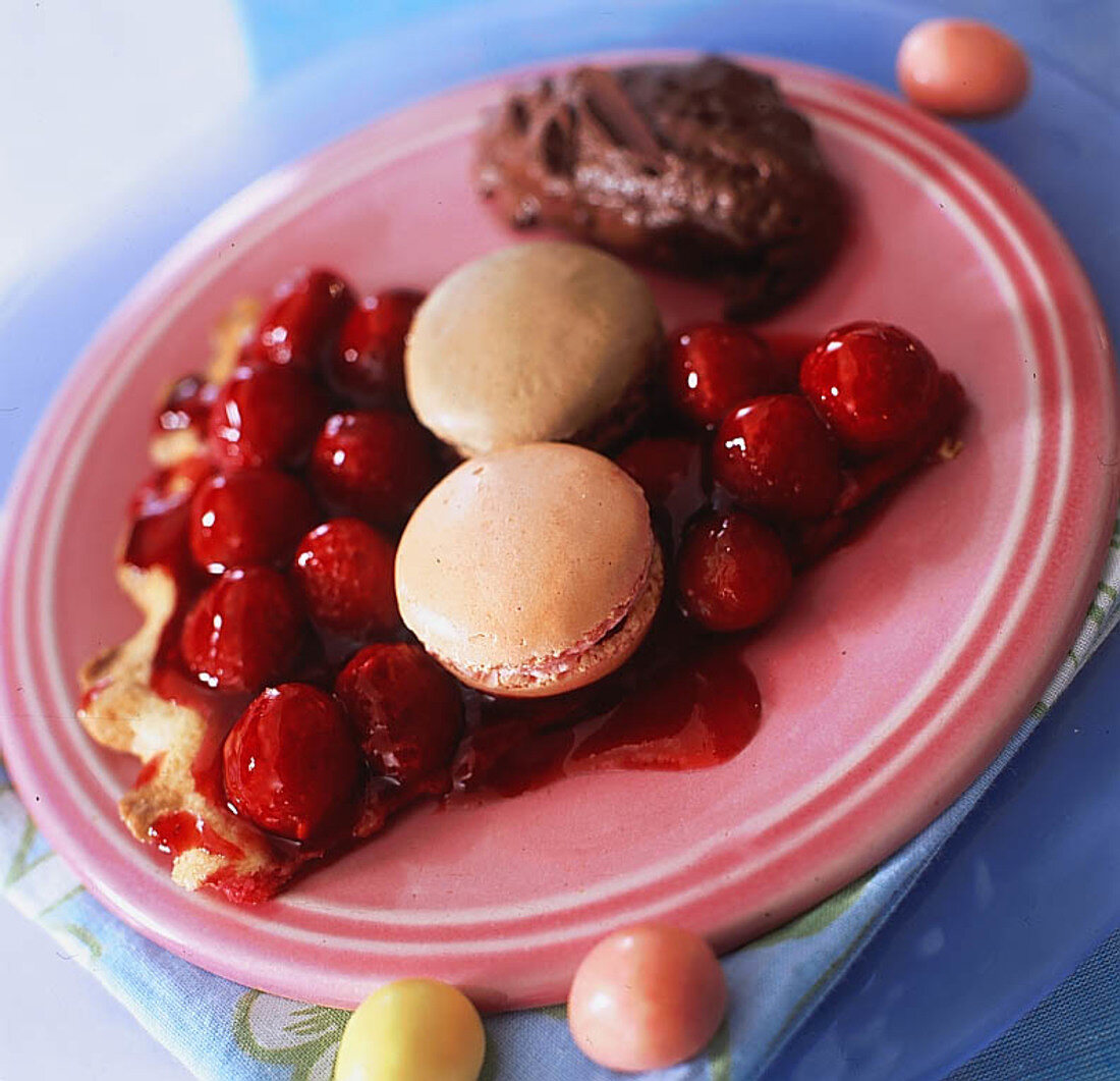 Raspberry tarts and chocolate macaroons and mousses