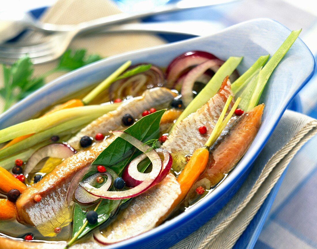 herring fillets in oil with vegetables
