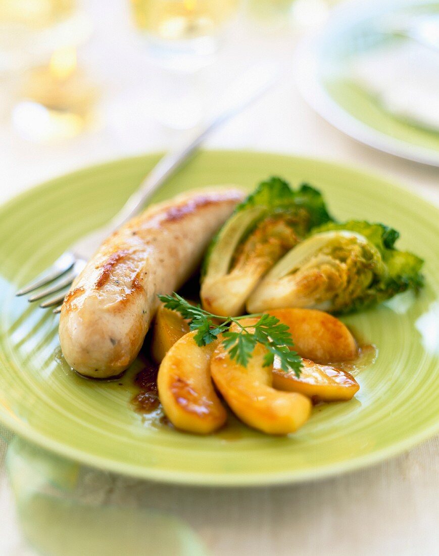 White sausage with apples and mini cabbages