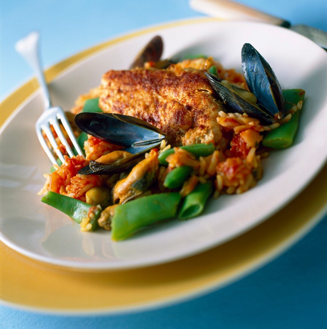 Chicken pilaf with mussels and saffron rice