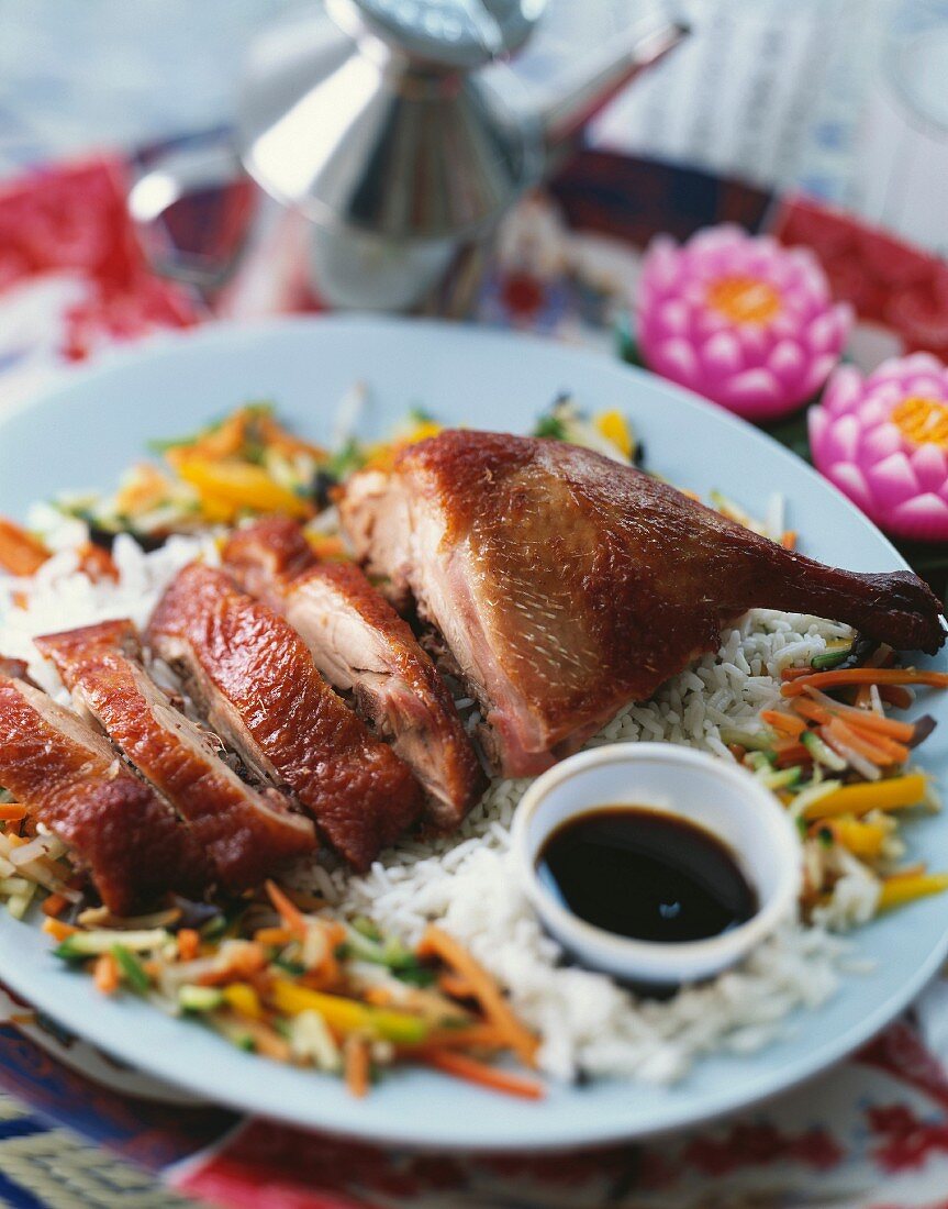 Half a Peking duck with soy sauce, oriental dish