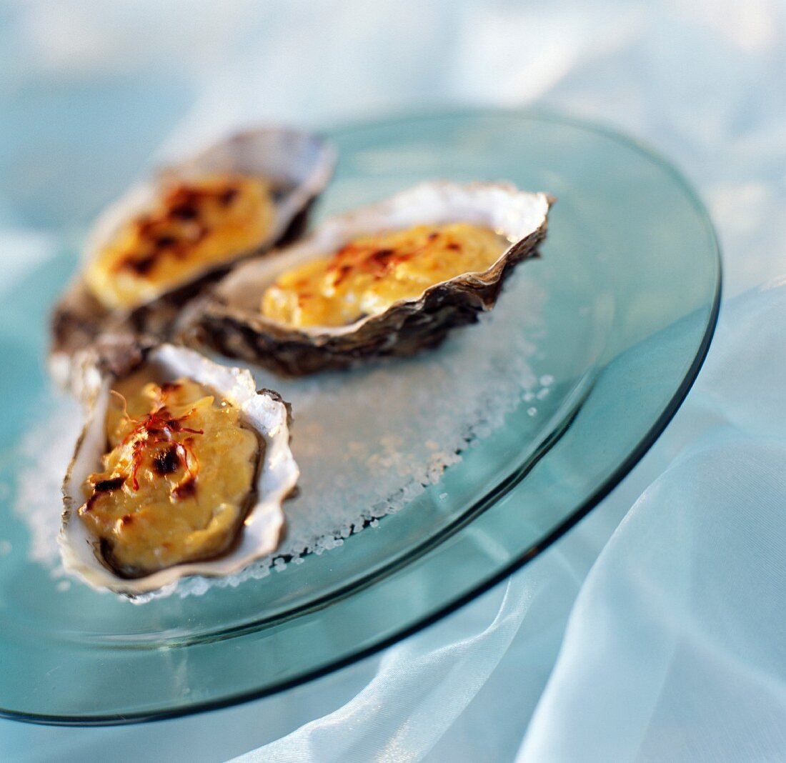Hot oysters with saffron cream