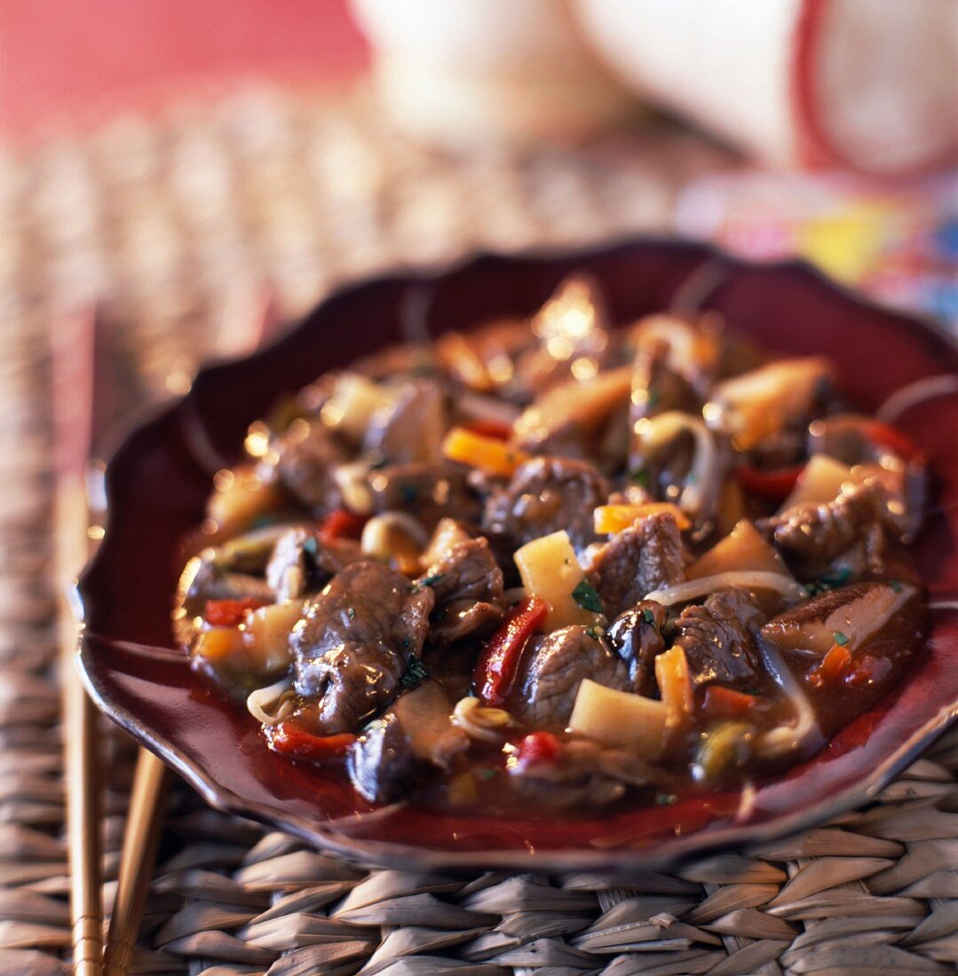 Asian-style thinly sliced beef with mushrooms