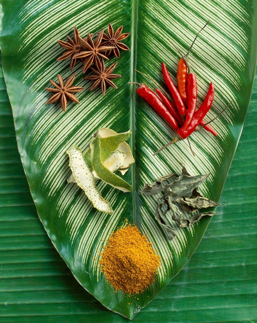 Selection of spices on palm leaf