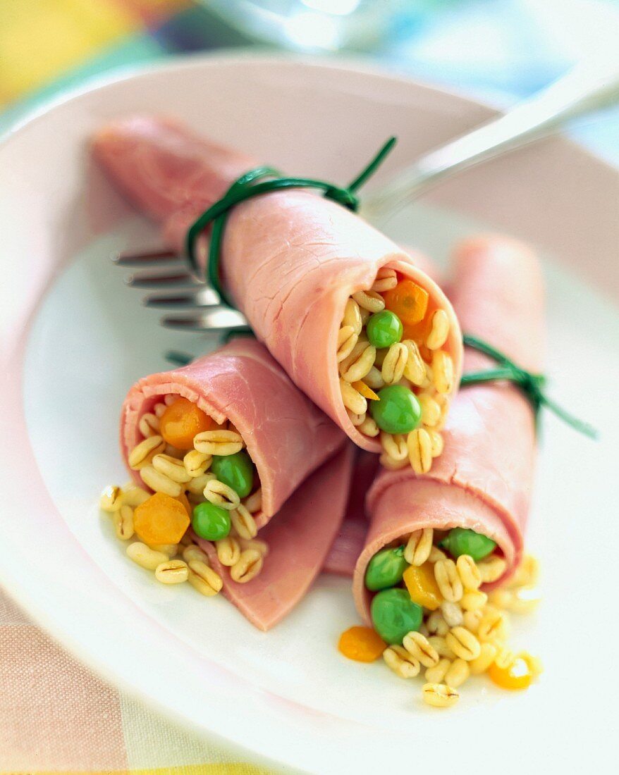 Rolled ham filled with wheat, lemon and mint tabouleh