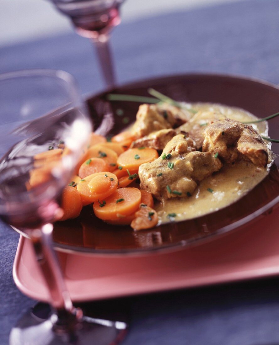 Wild boar with mustard sauce and carrots