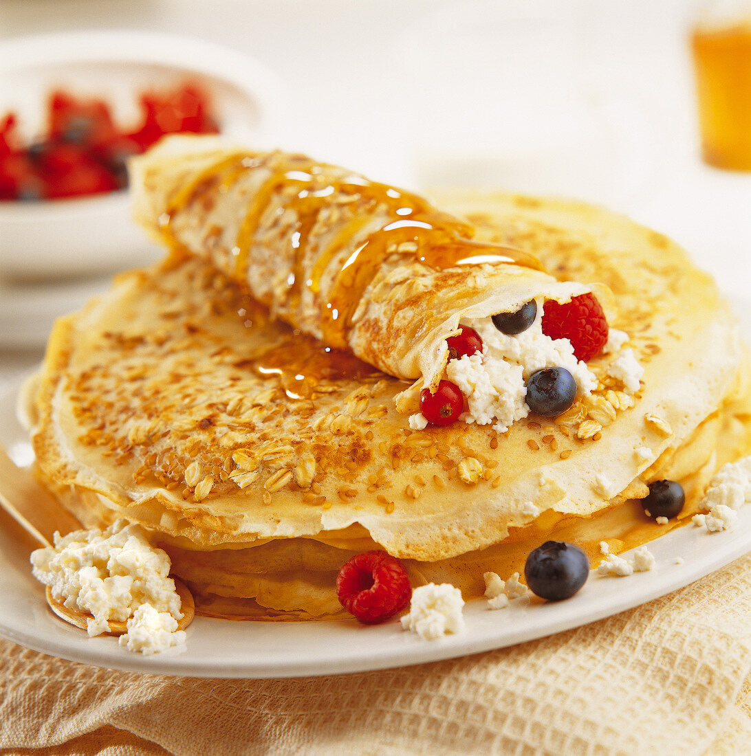 Crepes filled with fruit and cheese