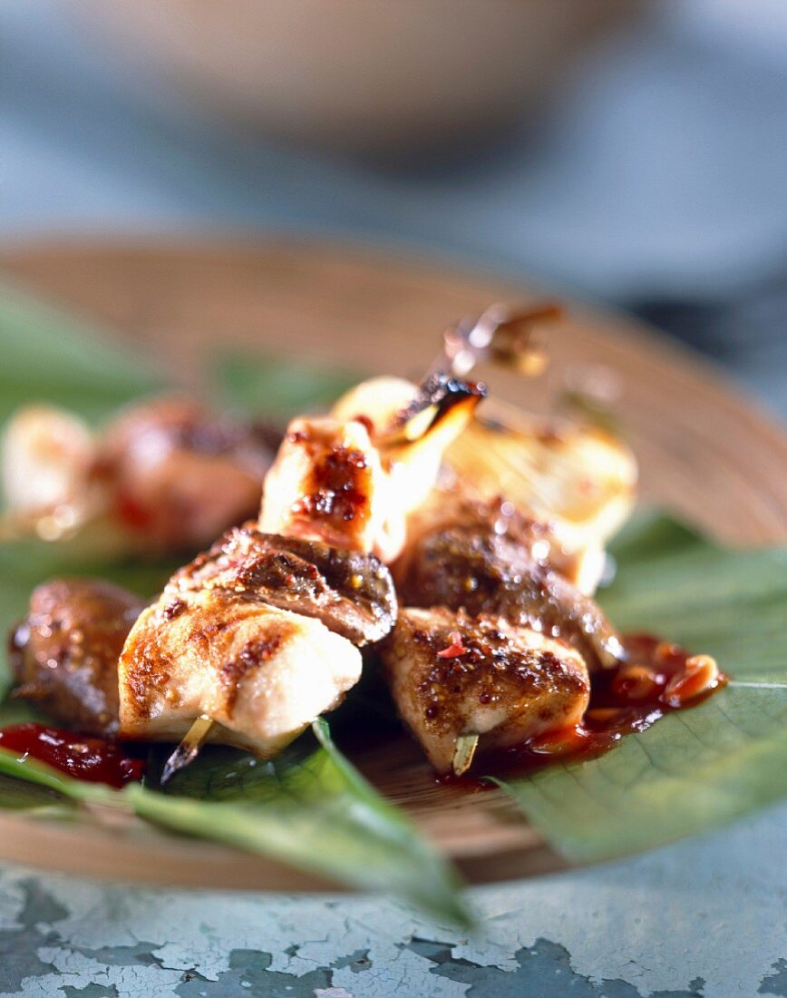Rabbit skewers with barbecue sauce
