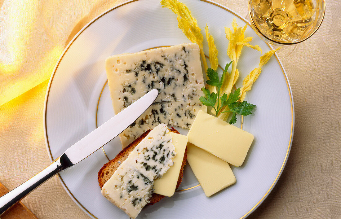 Plate of Roquefort cheese and butter with knife