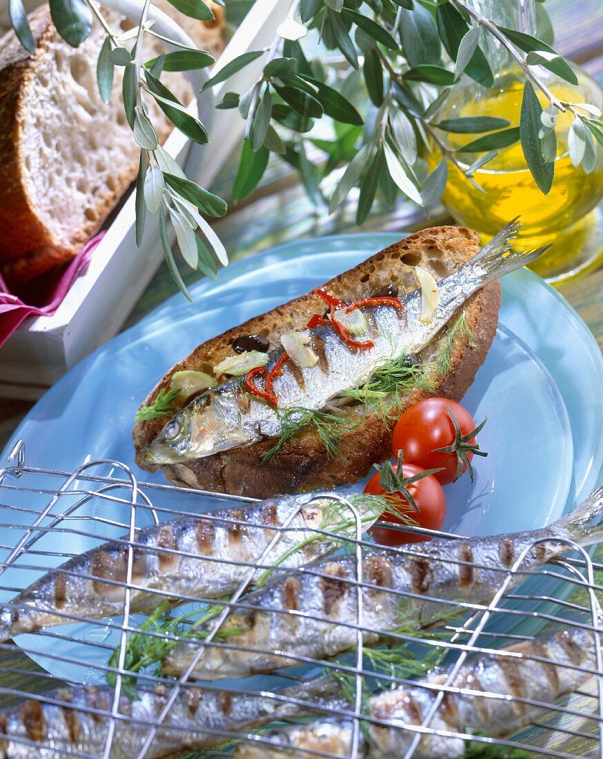 Grilled sardines marinated in olive oil