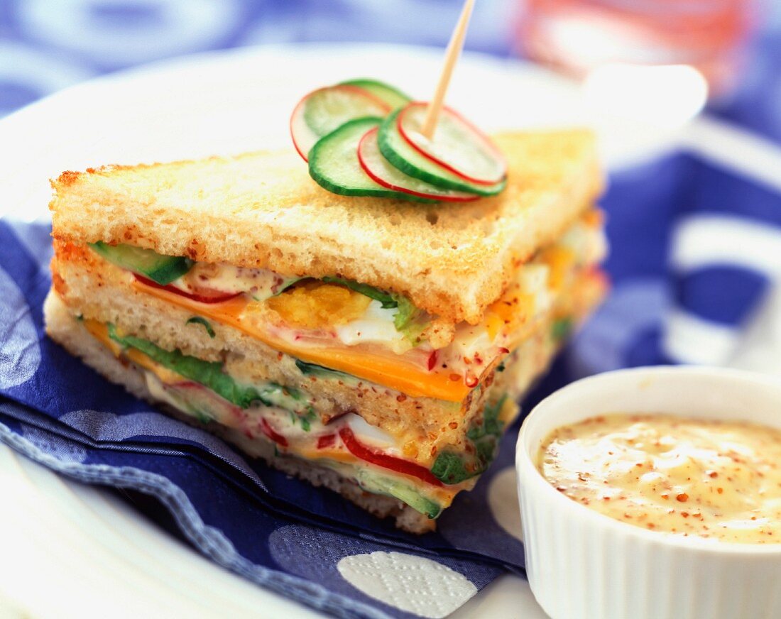 Raw vegetable club sandwich with mustard