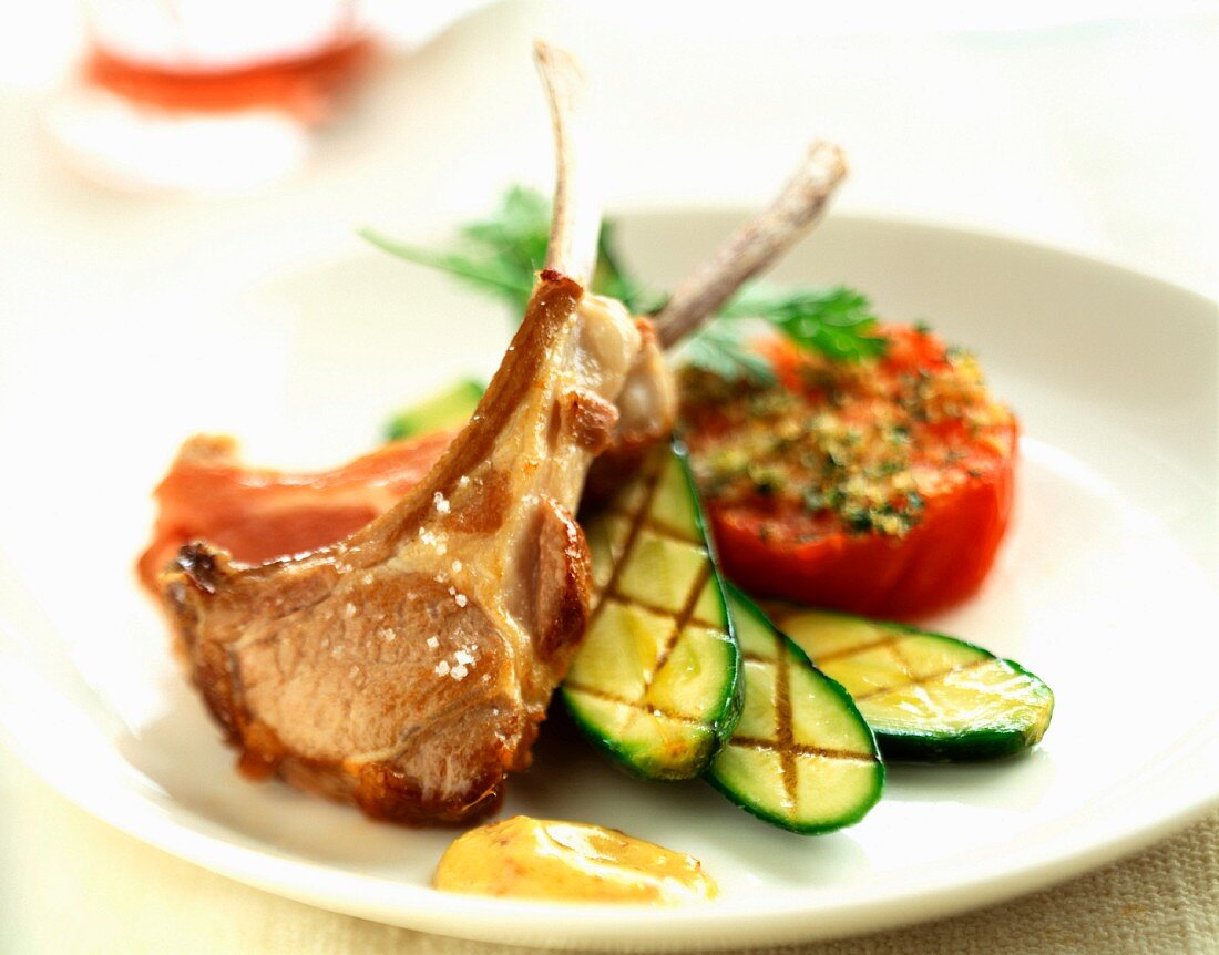 Lamb chops with grilled tomatoes and courgettes