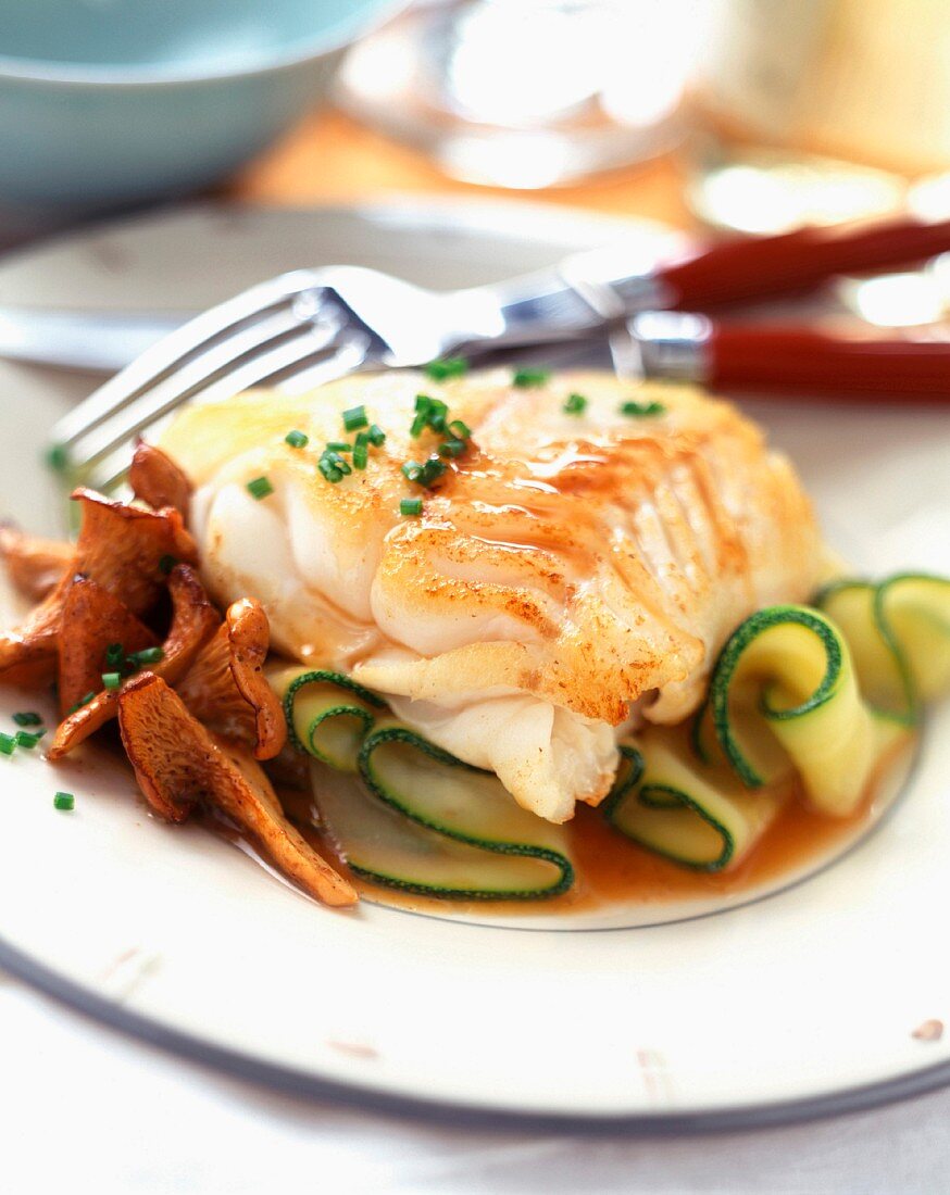 Fillet of cod with girolle mushrooms and courgettes