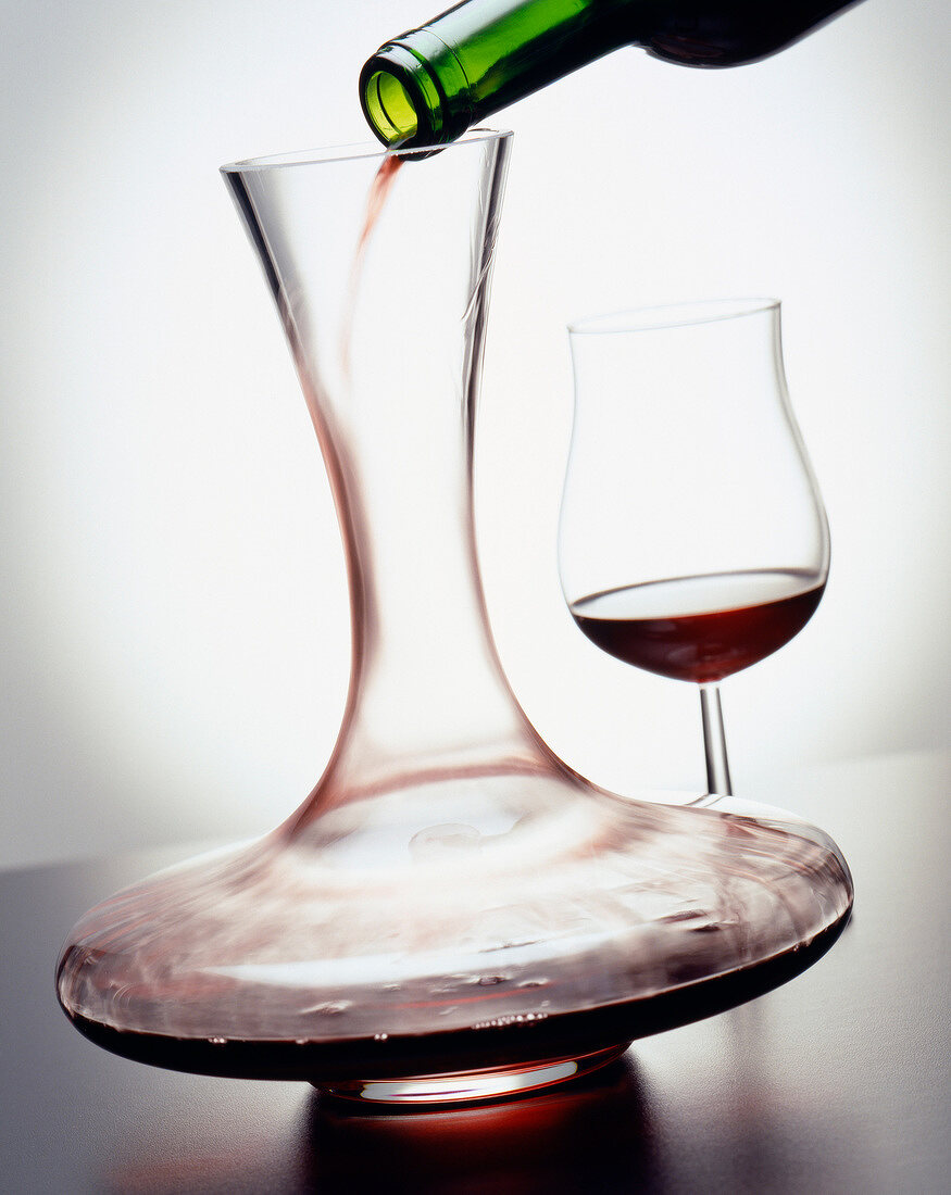 Decanter and glass of Bordeaux red wine