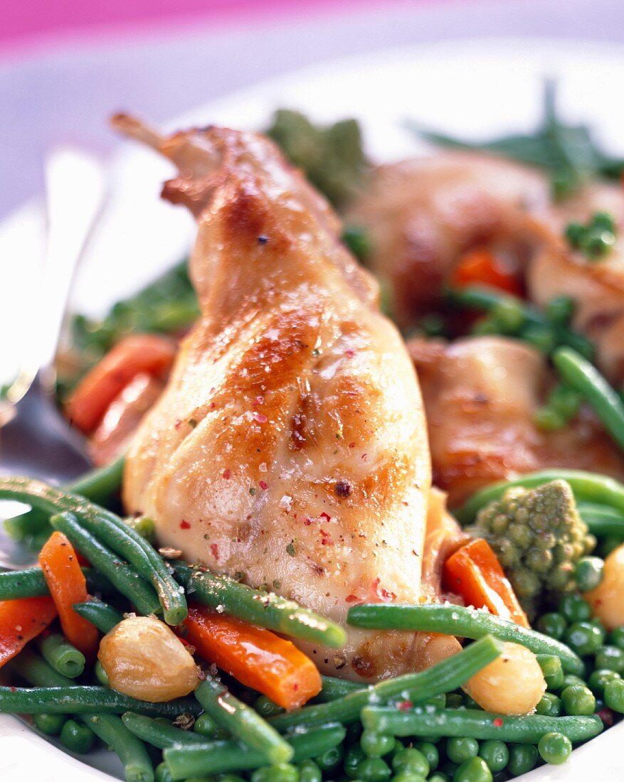Roast rabbit with young vegetables