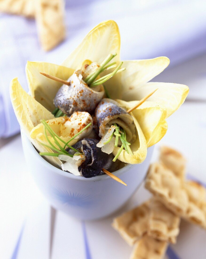 Chicory and rollmop salad with paprika cream
