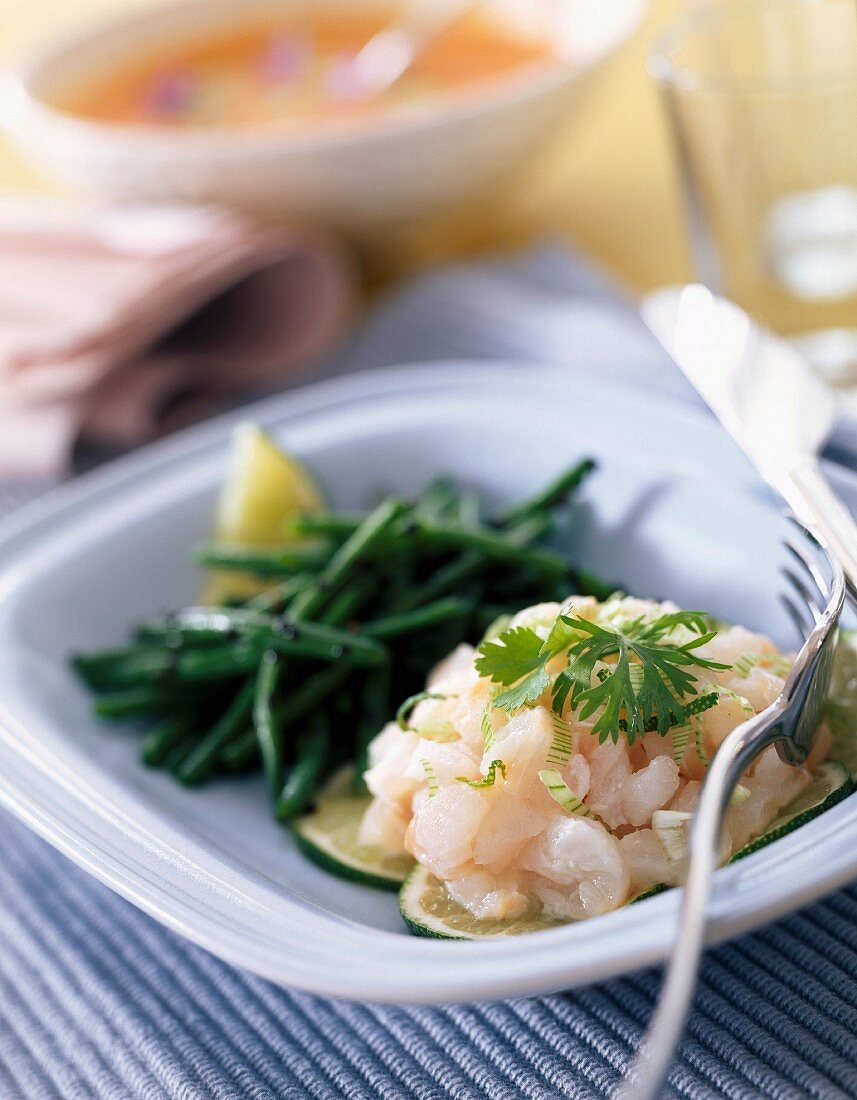 Scorpion fish tartare and French beans with sesame seeds