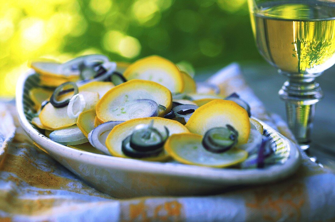 Yellow courgette and onion salad