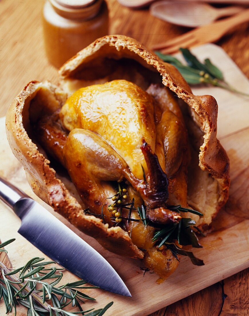 Guinea fowl baked in salt and herb case