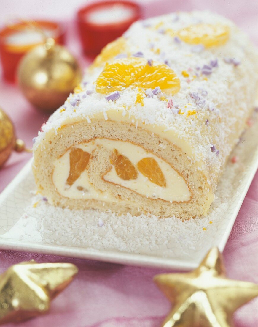 White chocolate, mandarin and coconut Christmas log cake