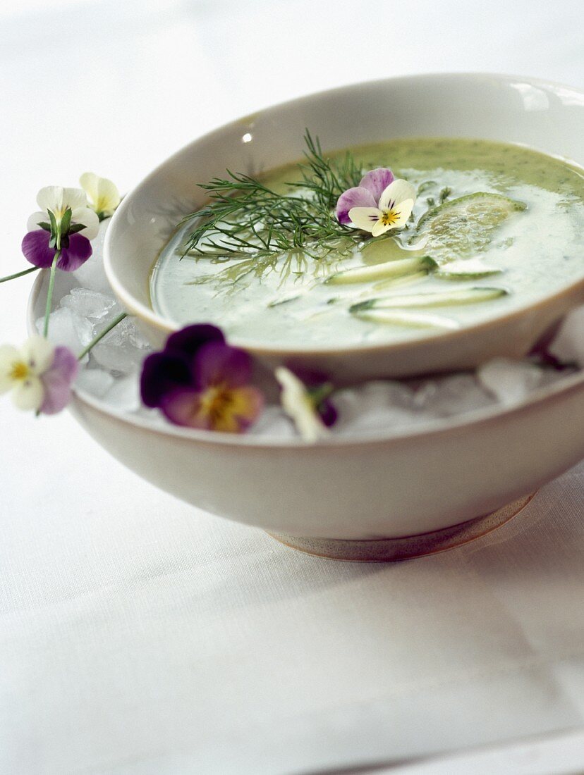 Chilled cucumber and pansy soup