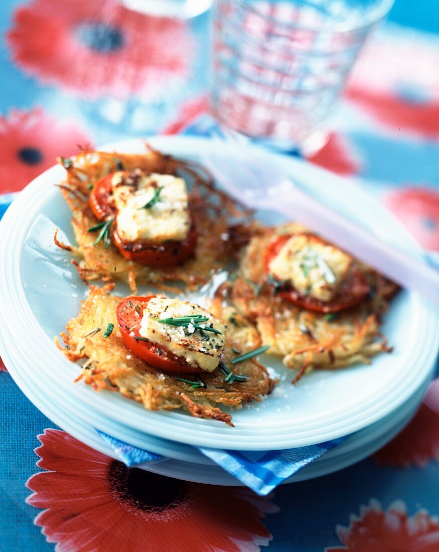 Potato cakes with tomato and goat's cheese